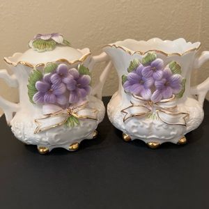 Vintage Porcelain of sugar and creamer raised purples violets